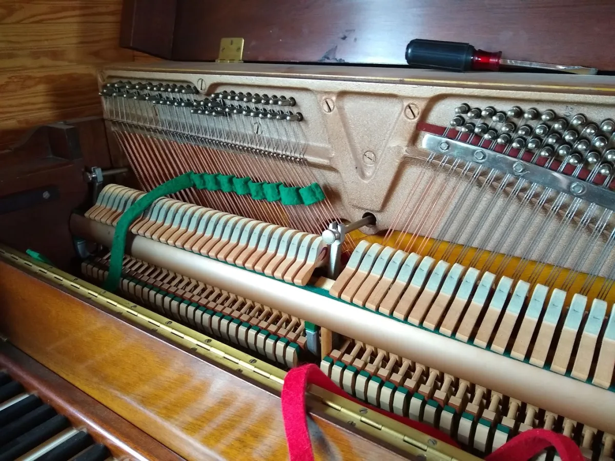 Cody Handlin tuning a piano