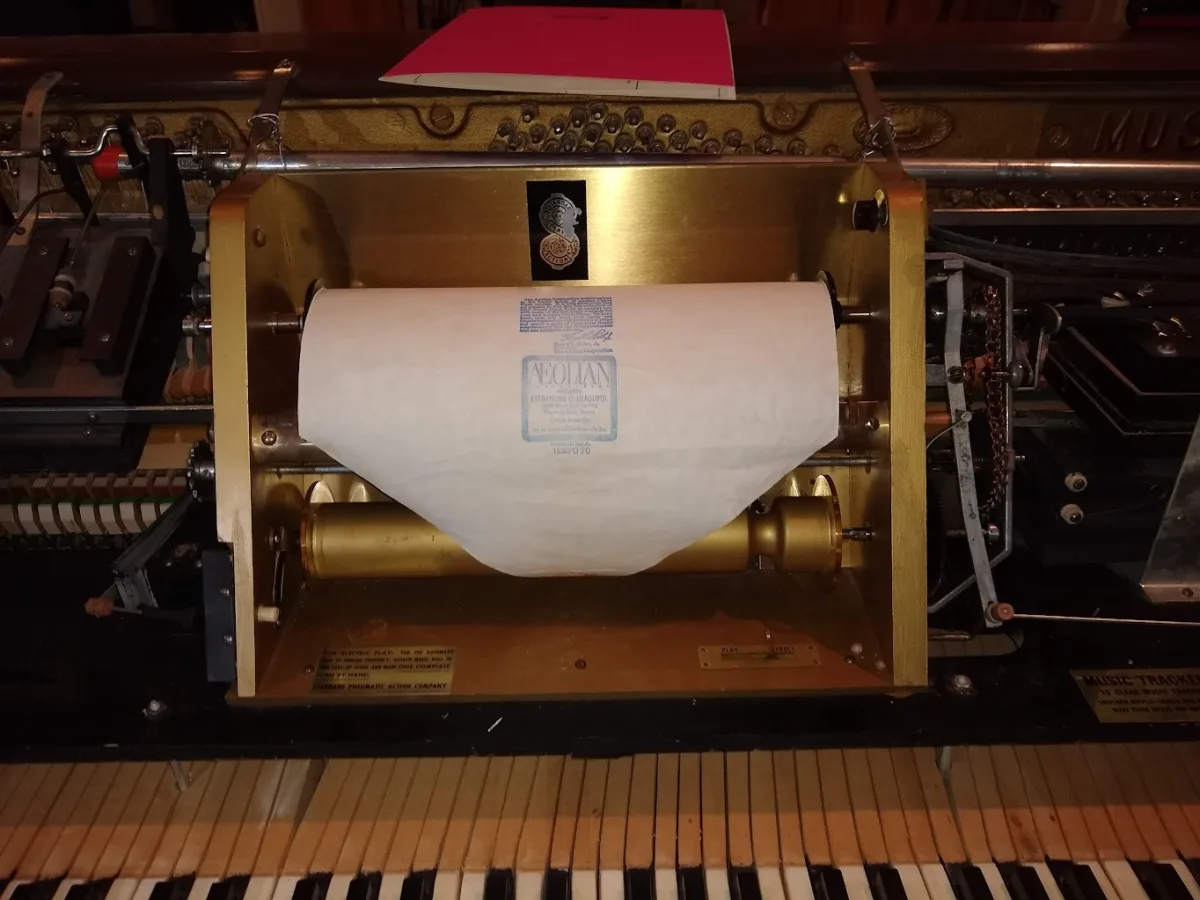 Cody Handlin tuning an upright piano